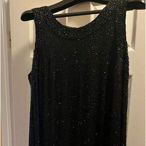 Beaded elegant woman's dress by Laurence Kazar